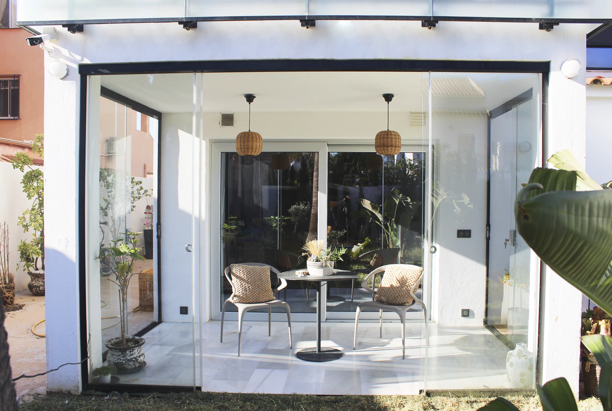 Covered patio glass opening with the sliding panels open
